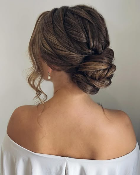 Low Bun With Tendrils, Soft Romantic Updo Low Buns, Twisted Low Bun Wedding Hair, Wedding Twist Hairstyles, Romantic Low Bun Wedding, Messy Bun For Wedding, Loose Low Bun Wedding Hair, Bride Low Bun Hairstyles, Low Wedding Bun