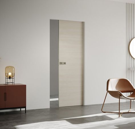 Achieving maximum flexibility (and style) with frameless pocket doors Frameless Sliding Doors, Frameless Door, Cavity Wall, Sliding Pocket Doors, Pocket Door, Doors Sliding, Hidden Door, Doors And Hardware, Partition Wall