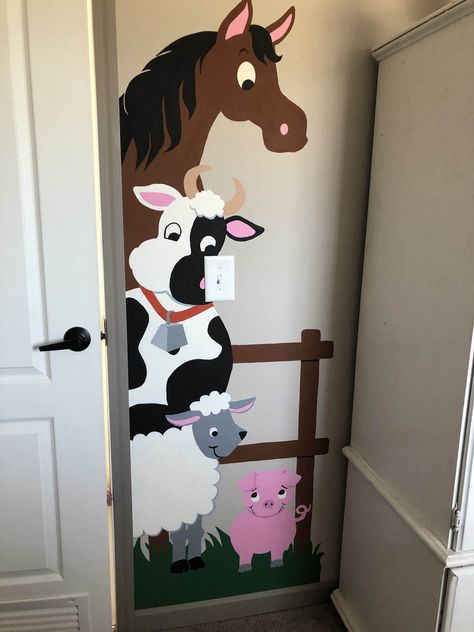 Barnyard Doorhugger Paint-by-Number Wall Mural Your favorite friends don't take up much space in this barnyard mural, they just peek around the edge of your door to welcome you into the room. This adorable paint by number farm mural includes a big brown horse, a tan & white cow, a happy little lamb and a cute little pink pig. Patterns can be reversed and/or repeated. Pair up this wall mural with any of these bedding sets: "Farm Babies" or Critter Chatter by NoJo,"Farm Yard" by Kimberly Grant, or Farm Classroom Decorations, Farming Crafts, Barnyard Classroom, Farm Mural, Farm Classroom, Farm Classroom Theme, Preschool Door, Farm Animal Painting, Painted Mural