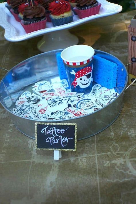 1st Birthday Pirate Theme, Tattoo Parlor Pirate Party, Pirate Party Tattoo Parlor, Mermaid And Pirate Party Food, Pirate Themed Party Decorations, Pirate Themed 1st Birthday Party, Pirate Party Ideas Decorating, Mermaid Pirate Party Decorations, A Pirates Life Four Me Party