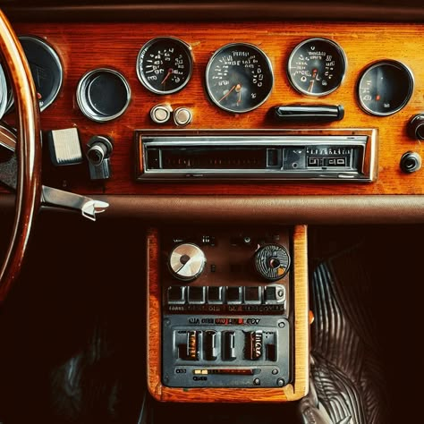 Retro car dashboard panel made of wood and leather, adorned with analog gauges and switches. Vintage Car Dashboard, Old Car Dashboard, Retro Futuristic Car, Wooden Trestle Table, Wooden Interior, Car Gauges, Inside Car, Dashboard Car, Serge Lutens