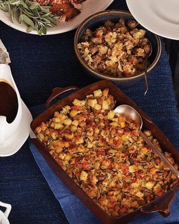 Shiitake Mushroom Stuffing and Sausage Stuffing - Bread stuffing with shiitake mushrooms, dried apricots, and fresh sage and thyme can be made vegetarian-friendly by moistening with vegetable stock and heating in a baking dish. For the meat eaters, add browned Italian sausage to the stuffing and bake it in the turkey. Basic Stuffing Recipe, Bread Stuffing, Sausage Stuffing, Vegan Holiday, Thanksgiving Stuffing, Potato Bread, Stuffing Recipes, Thanksgiving Sides, Challah