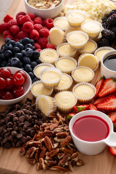 How To Make an Epic Mini Cheesecake Board - Eating With Erica Mini Cheesecake Bar, Cheesecake Bar At Wedding, Cheesecake Board, Dessert Bar Party, Mini Cheesecake Bites, Raspberry Chocolate Chip, Cheesecake Bar, Dinner Party Desserts, Dessert Spread