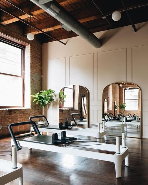 Rejuvenation on Instagram: "A bestseller for its stylish look and feel, our Arched Metal Framed Floor Mirror is also contract grade. Designed to be used in residences and commercial spaces alike, we love the way @pageonepilates brought an elegant touch to their studio. Design by @carolineturnerinteriors, photo by @johnstoffer #myonepiece" Boutique Gym Design Fitness Studio, Pilates Studio Design, Pilates Studio Design Interiors, Framed Floor Mirror, Pilates Yoga Studio, Home Pilates Studio, Pilates Room, Dance Studio Design, Home Dance Studio