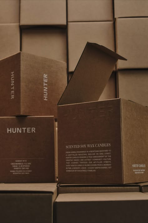 brown boxes with white typography Luxury Kraft Packaging, Brown Packaging Design, Brown Box Packaging, Perfume Package, Kraft Box Packaging, Furniture Packaging, Brown Packaging, Candle Boxes, Corrugated Packaging