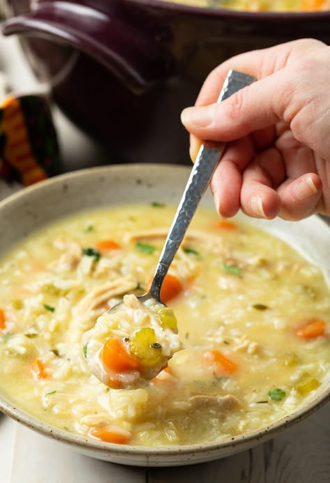 A comforting classic soup recipe that is made ultra creamy and rich with parmesan cheese and our gluten-free secret ingredient. #aspicyperspective #foodblog #foodie #instayum #hungry #thekitchn #onmytable #dailyfoodfeed #foodlove #foodpic #instafood #foodstagram #tasty #chickenandricesoup #chickenandrice #chickenrice #soup #homemade #comfortfood #holidays Savory Soup Recipes, Creamy Parmesan Chicken, Creamy Chicken And Rice, Rice Soup Recipes, Chicken Rice Soup, Creamy Parmesan, Parmesan Chicken, Savory Soups, Chicken And Rice