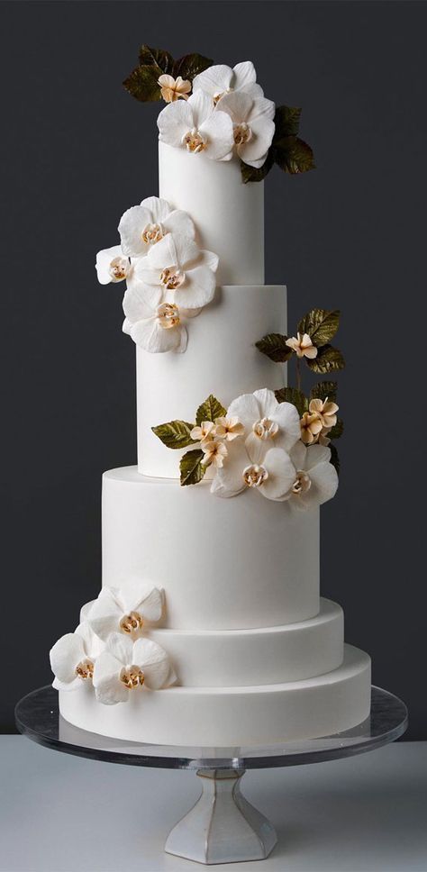 wedding cake, the most beautiful wedding cake, elegant wedding cake, wedding cake design, wedding cake inspiration, wedding cake photos, opulent wedding cake, wedding cake pictures, wedding cakes, wedding cake trends Spiral Wedding Cake, Wedding Cakes With Orchids, Blue Orchid Wedding Cake, Wedding Cake Designs Elegant White, White Orchid Wedding Cake, Simple Wedding Cake Table Ideas, Wedding Cake Designs Elegant 2024, Wedding Cake Trends For 2024, Chocolate Cake Decoration Elegant