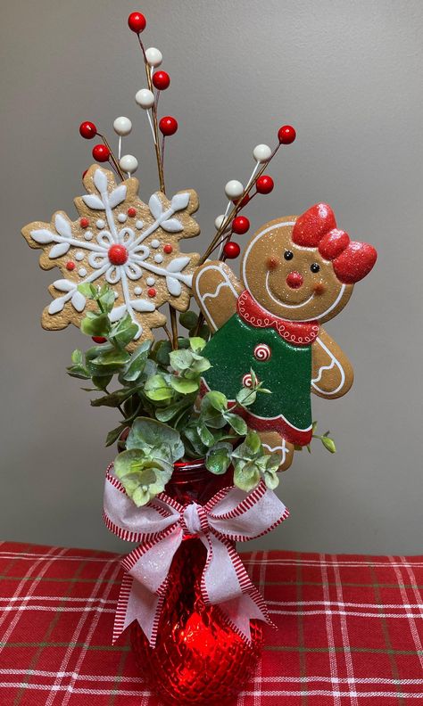 Adorable Gingerbread Gingerbread Table Decor, Diy Gingerbread Centerpiece, Gingerbread Centerpieces Diy, Gingerbread Pencil Christmas Tree, Gingerbread Party Centerpieces, Gingerbread Flower Arrangement, Gingerbread Centerpiece Ideas, Gingerbread Arrangements, Gingerbread Floral Arrangement