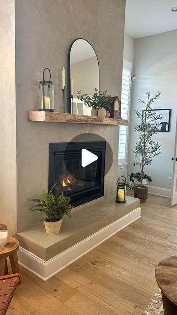 Lory Colella | Home design/decor + DIY on Instagram: "One of my most frequently asked questions…  What is on your fireplace?  It actually a faux concrete! A really affordable option to this very cool modern/industrial look!  The mantle is also always asked about and it’s a solid maple piece from a local woodworker, raw edge. The best part is our antique clock gifted by my parents this Christmas 🫶  Follow me here, @thecolellahome, for more design tips and inspiration!  #Fireplace #FireplaceInspiration #FauxConcreteFireplace #NeutralHome #ModernOrganic #VintageDecor #InteriorDesign #InteriorStyle #ａｅｓｔｈｅｔｉｃ #CozyHome #HouseToHome #HomeSweetHome" Concrete Electric Fireplace, Concrete Fireplace With Wood Mantle, Faux Concrete Fireplace, Wood Mantle Fireplace, Wood Mantle, The Mantle, Concrete Fireplace, Antique Clock, Diy Fireplace