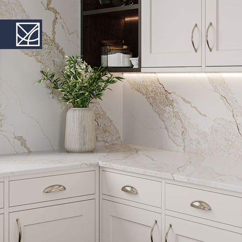 'Moon Valley' by Vadara Quartz: a captivating new design characterized by its warm white backdrop adorned with graceful veins in tones of gray, gold, and brown, meandering and intertwining across the surface. Available now at UGM, the wide gold veining of this product adds a striking elegance, perfectly in tune with the current trend among designers who favor warm tones and gold accents for their projects. Gold Vein Quartz Countertop, Vadara Quartz, Valley Kitchen, Ensuite Ideas, Kitchen Cabinetry Design, Gold Veins, White Quartz Counter, Quartz Surfacing, Quartz Countertop