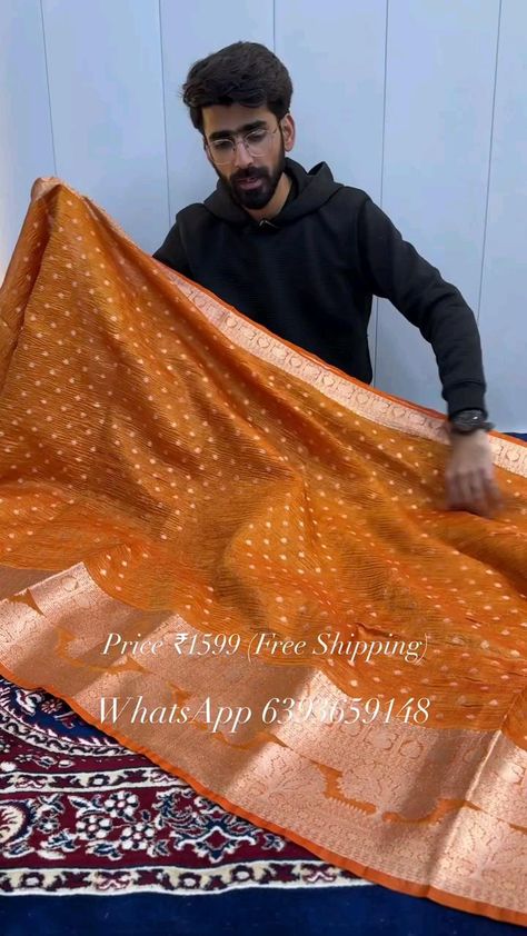 Orange Crushed Tissue Silk Banarasi Saree with Zari Traditional Buti Price ₹1599 Free Shipping To order kindly DM or WhatsApp us at 6393659148#banarasisaree #tissuesilksaree #crushsaree #designersarees #silksarees #handloom Online Sarees With Price, Tassels Designs, Saree Tassels Designs, Silk Banarasi Saree, Tissue Silk Saree, Saree Tassels, Bridal Sarees South Indian, Sarees With Price, Mysore Silk Saree