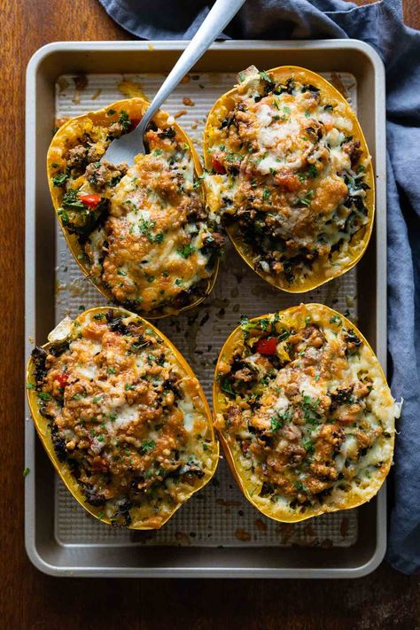 Low-Carb Stuffed Spaghetti Squash - Green Healthy Cooking Ground Pork Spaghetti Squash, Spaghetti Squash And Ground Turkey, Ground Turkey Spaghetti Squash, Dinner Ideas Healthy Easy, Low Carb Spaghetti Squash, Spaghetti Squash Boats, Healthy Squash Recipes, Spaghetti Squash Boat, Squash Boats