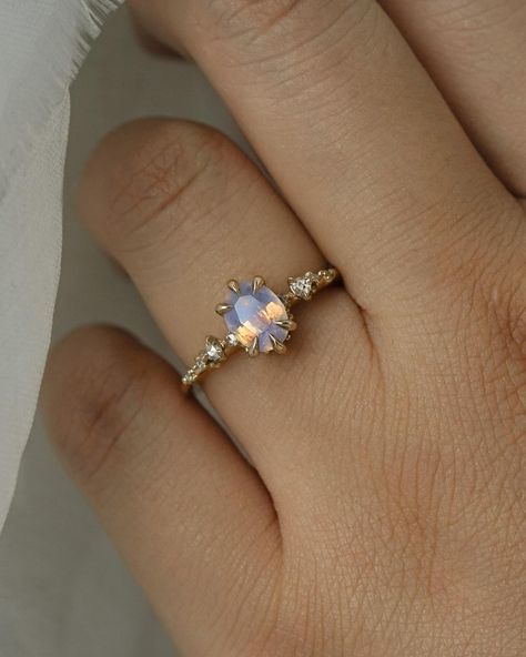 Of the sweetest opalescent dreams✨Shimmering with cool lavender and warm gold, our Nereid made bespoke with a truly magical sapphire — already at her forever home, and a special congrats to Angela & Ralph🧚 Elegant Jewelry With Lab-created Sapphire, Opalescent Sapphire Ring, Starbrite Cut Sapphire, Elegant Sapphire Opal Ring For Gift, Elegant Rainbow Sapphire Gemstone Ring, Opalescent Sapphire, Sapphire Ring, Lavender, Sapphire