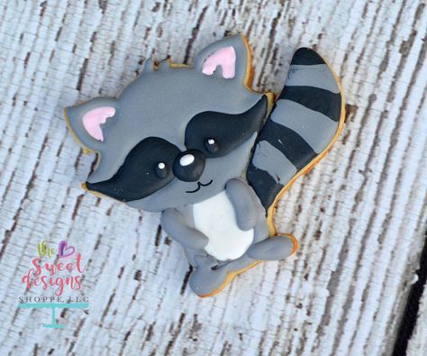 Raccoon cookie #woodlandcookiecutters #thesweetdesignsshoppe #customcookiecutters #decoratedcookie #woodlandcookies clipart by… Animal Cutouts, Cookie Decorations, Reindeer Face, Baby Cookies, Cookie Packaging, Animal Cookies, Baby Shower Cookies, Line Work, Cute Cookies