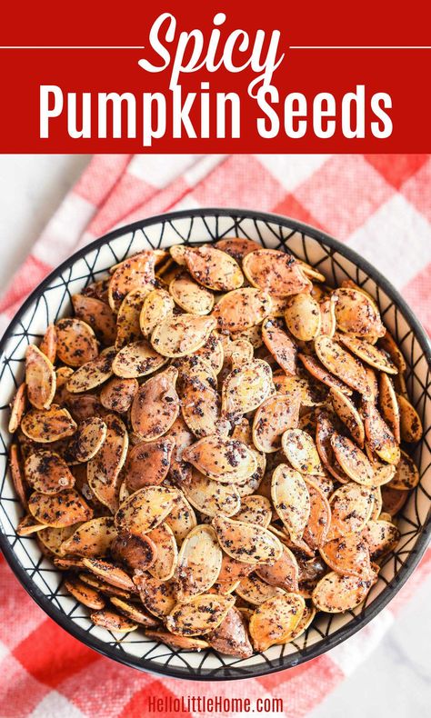 Looking for creative Fall Snack Ideas? Then you’re going to love these delicious Spicy Roasted Pumpkin Seeds! Learn how to make the BEST Spicy Pumpkin Seeds using simple ingredients: raw pumpkin seeds, olive oil, salt, and (chili powder, cayenne, and garlic). This homemade Baked Seeds recipe is hot and spicy savory treat that’s crispy, crunchy, and so easy to make. These healthy Toasted Chili Pumpkin Seeds are a great Vegetarian, Vegan, Dairy Free + Gluten Free snack recipe! | Hello Little Home Pumpkin Seed Recipes Baked, Fall Snack Ideas, Best Pumpkin Seed Recipe, Seasoned Pumpkin Seeds, Savory Pumpkin Seeds, Chili Pumpkin, Pumpkin Seed Recipes Roasted, Spicy Roasted Pumpkin Seeds, Spicy Pumpkin Seeds