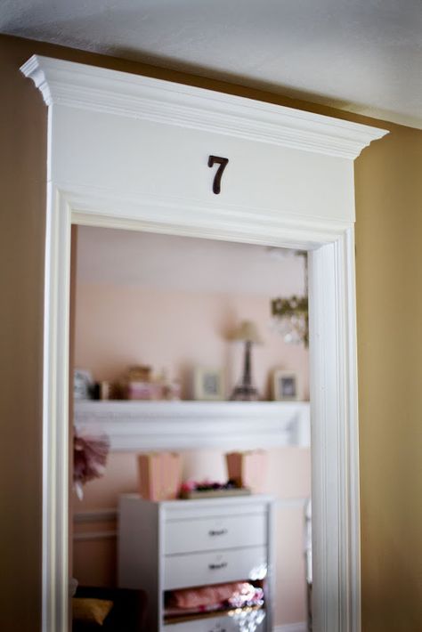 add trim and crown molding above a door frame - Tidbits from the Tremaynes Diy Door Header, Wainscoting Staircase, Wainscoting Stairs, Wainscoting Kitchen, Door Header, Wainscoting Bedroom, Window Decorating, Dining Room Wainscoting, Wainscoting Styles