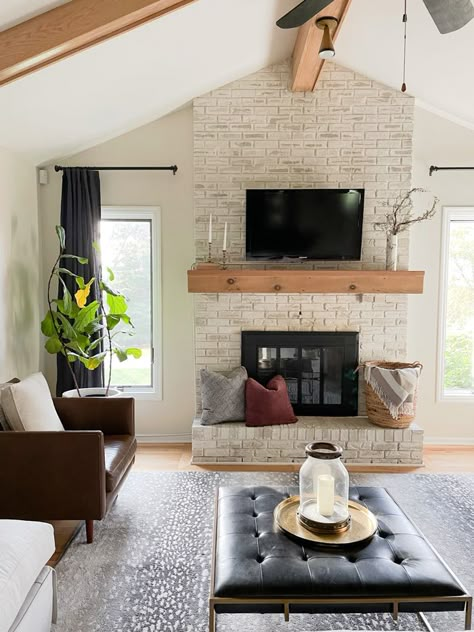 Bright Airy Living Room, Moody Christmas Decor, Fireplace With Tv, White Wash Brick Fireplace, Airy Living Room, Moody Christmas, Red Brick Fireplaces, White Brick Fireplace, Tv Mounted