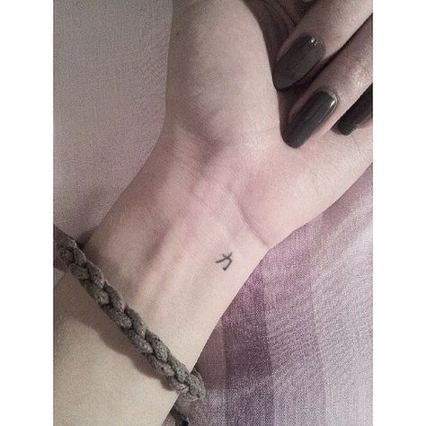 Teeny tiny wrist tattoo. The Chinese character for strength. Love!: Chinese Character Tattoos, Arrow Tattoos For Women, Tooth Tattoo, Kiss Tattoos, Tiny Tattoos For Women, Tiny Wrist Tattoos, Fan Tattoo, Strength Tattoo, 4 Tattoo