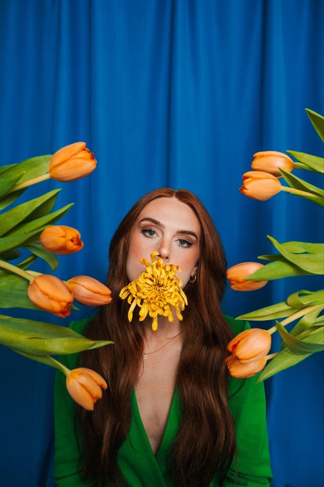 The Blossum - Ft. Lauren Revoir Where fashion and florals coexist Fashion shoot with CS Visuals Shot at The Lumen Room in Houston, TX with a blue seamless backdrop while incporporating orange tulips Orange Garden Photoshoot, Orange Backdrop Photoshoot, Orange Fashion Photography, Yellow Editorial Photography, Floral Editorial Shoot, Orange Tulips, Seamless Backdrop, Orange Background, Orange Dress