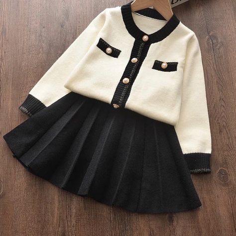 Blush Chérie on Instagram: “Chic and Classic Skirt set 🤍🖤 Chanel-esque Elegance!!!✨ Shine away lil doll 🌸🤍 Available 2 to 6yrs Swipe right - Dm💌 #kidswear…” Winter Clothes Kids, Baby Winter Clothes, Winter Baby Girl, Luxury Baby Clothes, Kids Fall Outfits, Kids Winter Outfits, Baby Girl Clothes Winter, Sweater Skirt Set, Winter Baby Clothes