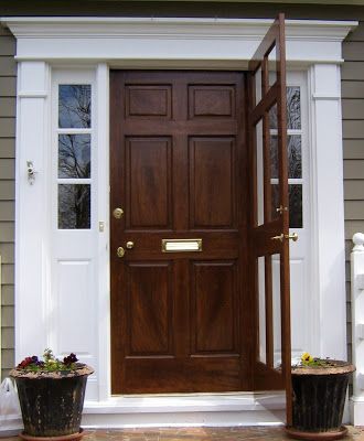 Wood Door With Storm Door, Colonial Front Door, Wood Storm Doors, Stained Front Door, Painted Exterior Doors, Brown Front Doors, Exterior Door Colors, Front Door Inspiration, Brown Doors