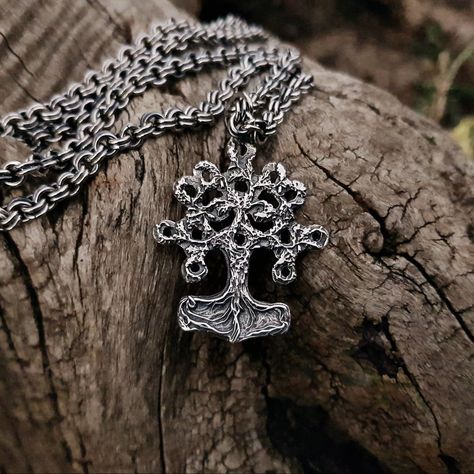 Yggdrasil mjolnir pendant ★Material: High Quality Solid 960 Sterling Silver★ Weight: approx. 9 grams (0,32 oz) Height:35 mm (1,37 inches) Width: 30 mm (1,18 inches) Two-sided Mjolnir Pendant Introducing the Mjolnir Pendant, a captivating piece of Viking jewelry that embodies the power and strength of the mighty Thor. Also known as the Thor Hammer Pendant, this remarkable accessory showcases the iconic symbol of Mjolnir, the legendary hammer wielded by the Norse god of thunder. Crafted wit... Thor's Hammer Mjolnir, Mjolnir Pendant, God Of Thunder, Thor Hammer, Norse Jewelry, The Mighty Thor, Viking Pendant, Thor's Hammer, Viking Jewelry