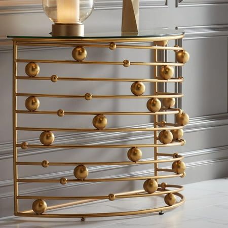 Enjoy the glam-luxe style of the Liam gold console table. From the 55 Downing Street brand, the design has a metal base that features a beaded design in a gold finish. The mirrored top adds an elegant touch to the overall vibe. Size: 29 x 37 x 16. Small Console Table Entryway, Modern Wood Console Table, Small Console Table, Living Room Lighting Tips, Gold Console Table, Console Table Styling, Motion Sensor Lights Outdoor, Large Ceiling Fans, Ceiling Fans Without Lights