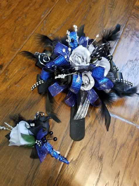 Royal Blue And Black Corsage And Boutonniere, Blue And Black Corsage Prom, Royal Blue And Black Prom Flowers, Royal Blue And Black Corsage, Royal Blue Corsage And Boutonniere, Prom Corsage Blue, Prom Corsage Diy, Black Corsage, Royal Blue Wedding Invitations