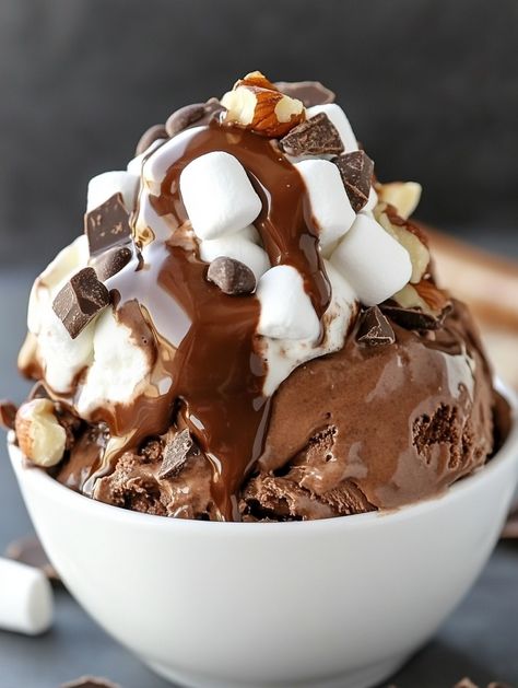 Rocky Road Ice Cream, The Perfect Chocolatey Treat! 🍦✨   🍨 𝗜𝗻𝗴𝗿𝗲𝗱𝗶𝗲𝗻𝘁𝘀 🍨 For the Ice Cream Base: 2 cups heavy cream 1 cup whole milk 3/4 cup granulated sugar 1 tsp vanilla extract 1/2 cup unsweetened cocoa powder For the Mix-Ins: 1/2 cup mini marshmallows 1/2 cup chopped nuts (walnuts or almonds) 1/2 cup chocolate chips 🍨🍨 Quick Sweets, Dipped Berries, Nice Cream Recipes, Chocolate Covered Strawberry Cake, Rocky Road Ice Cream, Sundae Toppings, Triple Chocolate Mousse Cake, Ice Cream Homemade, Cups Recipes