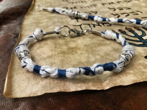 TZITZIT BRACELET Size 8 1/4 Inch Torah Tallit Deut 6:8 Hebrew Bible tzit tzit  10-5-6-5 Name of Crea Tzitzit Bracelet, Jewish Crafts, Bible College, Hebrew Bible, Bible History, Jewish Jewelry, Bracelet Knots, Torah, Tie Knots