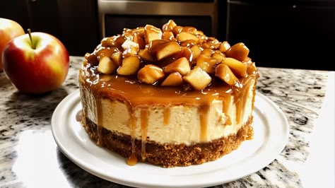 This Caramel Apple Cheesecake is the ultimate fall dessert! With creamy cheesecake, spiced apples, and rich caramel sauce, it's a flavor-packed treat that screams autumn. Whether you're hosting a gathering or treating yourself, this indulgent dessert is a must-try. Unlock the secret to this amazing dish – get the recipe now! #CaramelAppleCheesecake #FallDesserts #CheesecakeRecipe #EasyCheesecake #AppleCheesecake #CaramelDessert #BakingInspiration #AutumnRecipes #SweetTreats #DessertLovers Apple Pie With Cheese, Caramel Apple Spice Cake, Caramel Apple Cheesecake Recipes, Spiced Cheesecake, Apple Cheesecake Recipes, Apple Topping, Caramel Recipe Easy, Southern Caramel Cake, Pumpkin Pecan Cobbler