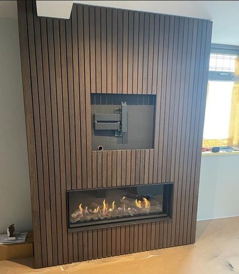 Tv On Slatted Wall, Wood Slat Tv Wall With Fireplace, Electric Fireplace Feature Wall Ideas, Slat Wall Electric Fireplace, Wood Slates Tv Wall, Wood Slat Fireplace Wall Living Room, Electric Fireplace Slat Wall, How To Decorate With Art, Black Panel Tv Wall