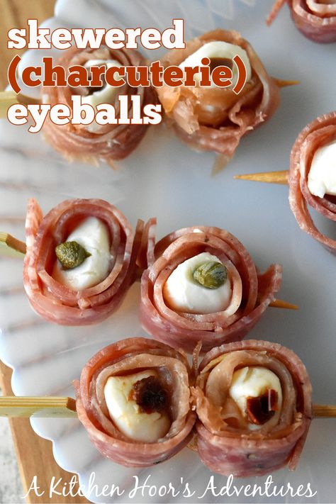 Skewered (Charcuterie) Eyeballs are the perfect centerpiece for your Halloween board! Guaranteed to be the ghostly talk of your Halloween party! ???? #EatDrinkandBeScary #HalloweenTreatsWeek #SpooktacularEats #charcuterie Eyeball Charcuterie, Charcuterie Eyeballs, Halloween Eyeball Appetizers, Halloween Skewers, Halloween Charcuterie Board, Halloween Cocktail Party, Charcuterie Meats, Halloween Charcuterie, Halloween Board