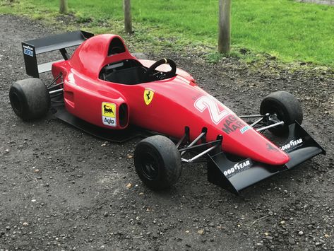 This kid’s car is based on a Ferrari 640 F1-89 – the car remembered for being the first to use now-dominant semi-automtic gearbox technology in Formula 1. Teething problems with the new transmission had hampered the car’s development, but by the time it lined up on the grid in 1989 it had progressed to the... Formula Student, Kids Electric Car, Custom Bikes Cafe Racers, Diy Go Kart, Number 21, Kids Car, Go Car, Miniature Cars, Ferrari Car