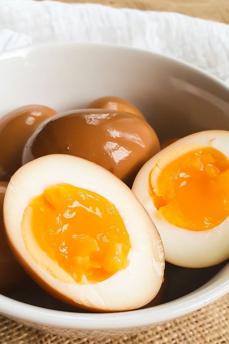 Ramen Eggs, known as Ajitama or ajitsuke tamago, are out of this world tasty! These Paleo Ramen Eggs are perfect to add to a brothy soup, as a side dish to your favorite takeaway meal, or eat them as a snack! They travel and keep well, just like regular boiled eggs. Perfect for lunchboxes! #paleo #ramen #rameneggs #eggs #whole30 Paleo Ramen, Ramen Egg Recipe, Brothy Soup, Ramen Eggs, Ramen Egg, Whole30 Keto, Healthy Protein Snacks, Whole 30 Diet, Protein Snack