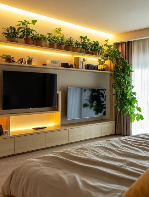 Create the perfect relaxing oasis with this cozy bedroom TV setup! Featuring a stylish TV unit with lush indoor plants, it enhances any space with warmth and greenery. Transform your room today! 🌱✨ #HomeDecor #IndoorPlants #CozyLiving Master Bedrooms Decor With Tv, Cozy Bedroom With Tv, Tv Ideas Bedroom, Bedroom Decor With Tv, Tv Setup Bedroom, Bedroom Tv Setup, Bedroom With Tv, Bedroom Tv Wall Ideas, Stylish Tv Unit