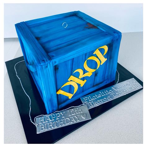 Fondant covered drop box cake ready for its balloon to be attended Fortnite Drop Box Cake, Fortnite Birthday Cakes, Birthday Cake For Son, Nerf Party Ideas, Fortnight Party, Fort Night, Cake Designs For Boy, Fortnite Cake, 8th Birthday Cake