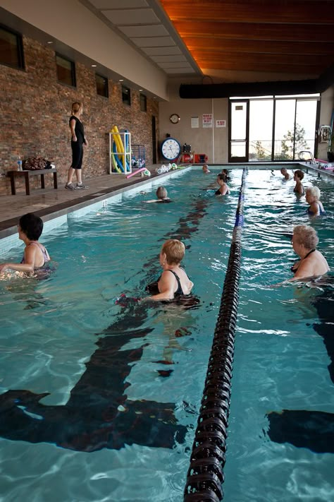 Our lap pool is used for lap swimming and water aerobics classes. It is also used for those unable to tolerate the warmer temperatures of the therapy pool. The warm water therapy pool is used for low-intensity water exercise, therapeutic movement or just a warm retreat for no-impact movement. The therapy pool is particularly good for members managing arthritis or fibromyalgia or members recovering from surgery or a serious injury that prevents them from participating in weight-bearing exercise. Wellness Center Design, Therapy Pools, Aquatic Therapy, Recovering From Surgery, Therapy Center, Water Therapy, Aerobics Classes, Note Taking Tips, Weight Bearing Exercises