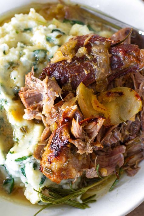 Apple Cider Braised Pork Shoulder! This delicious and comforting apple cider braised pork roast is perfect for fall. The meat is fall apart tender and so incredibly flavor-packed. It melts in your mouth. Pork Roast With Apple Chutney, Apple Braised Pork Shoulder, Apple Cider Braised Pork Shoulder Crockpot, Apple Cider Braised Pork Tenderloin, Cider Braised Pork Shoulder, Best Crockpot Pork Roast, Braised Pork With Sauerkraut And Apples, Pork Roast Shoulder Recipes, Braised Pork Loin Recipes Oven