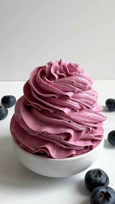 Blueberry buttercream frosting is smooth and creamy, perfect for piping onto cakes and cupcakes. Mixed Berry Buttercream Frosting, Blueberry Cream Cheese Icing, Blueberry Buttercream Frosting, Blueberry Icing, Easy Frosting Recipes, Blueberry Reduction, Frosting Cream Cheese, Blueberry Buttercream, At Home Baking