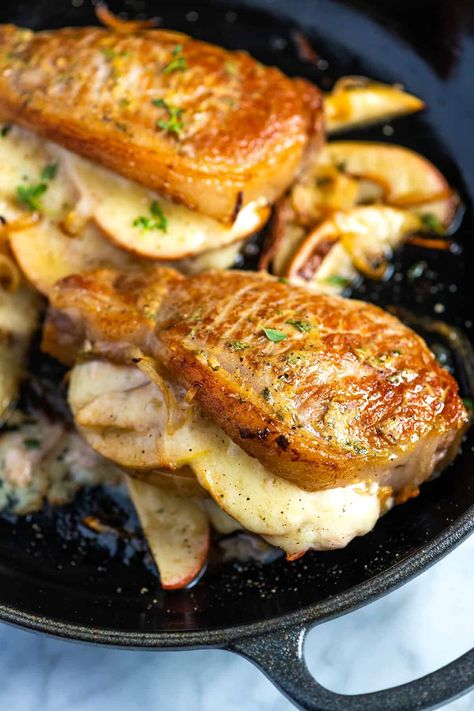 Cheesy Apple Stuffed Pork Chops Apple Brie Stuffed Pork Chops, Stuffed Pork Chops With Apples, Goat Cheese Pork Chops, Stuffed Pork Chops Baked In Oven, Stuffed Pork Chop Recipes, Apple Stuffed Pork Tenderloin, Apple Stuffed Pork Chops, Sautéed Apples, Thick Cut Pork Chops