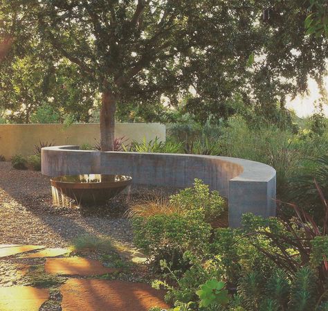 curved concrete wall Curved Stone Bench, Curved Concrete Wall, Curved Retaining Wall Ideas, Concrete Wall Landscape, Curved Outdoor Seating, Curved Concrete Bench, Concrete Garden Bench, Concrete Retaining Walls, Crows Nest