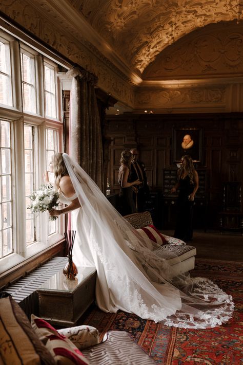 Bride looking out of window of large country ,manor house Traditional British Wedding, Wedding Manor House, Uk Countryside Wedding, Manor House Wedding Reception, English Country House Wedding, Country Manor Wedding, English Manor Wedding, Country Estate Wedding, Saltburn Wedding