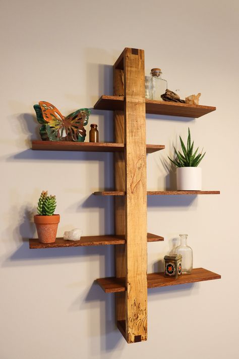 Handcrafted decorative shifting shelves.  Made from Spalted maple, and  African Mahogany (Sapele) spines with 5 individually adjustable African Mahogany (Sapele) shelves.  - Other options available - please visit other listings on our shop page.  https://acrossthegrainltdco.etsy.com Easy to hang with slotted screw holes for mounting. (mounting hardware not included) Soft hand rubbed oil finish that does not detract from the natural beauty of the wood.  Very unique way to decorate your walls as well as display trinkets, plants, tins, or anything that makes you happy. *Due to the unique nature of wood, each shelf has various differences in the grain of the wood.  Each individual shelf is one of a kind and may vary from what is pictured.* Dimensions:     Overall:  Height - 31.5 in , Width - 2 Wood Projects With Dimensions, Mid Century Modern Shelf, Pallet Bathroom Shelf, Modern Shelf Decor, Planter Shelf, Mid Century Modern Shelves, Wood Working Projects, Wooden Christmas Crafts, Shop Projects