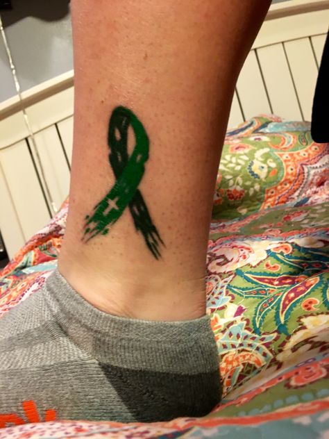 Green awareness ribbon for mental health and celiac disease Celiac Tattoo Ideas, Green Ribbon Tattoo, Ribbons Tattoo, Mental Health Ribbon, Buffalo Tattoo, Tattoos Dragon, Awareness Tattoo, Tattoos Butterfly, Ribbon Tattoos