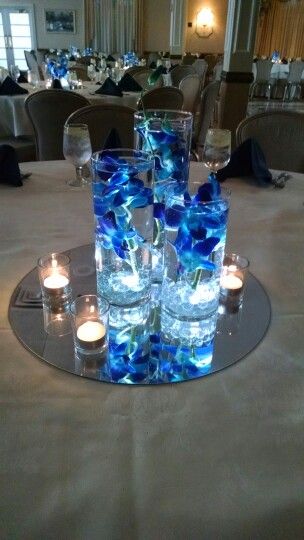 Table Flowers Arrangements, Centerpieces Orchids, Wedding Centerpieces Blue, Prom Centerpieces, Flowers Arrangements Wedding, Blue Floating Candles, Royal Blue Centerpieces, Centerpieces Blue, Centerpieces Quinceanera