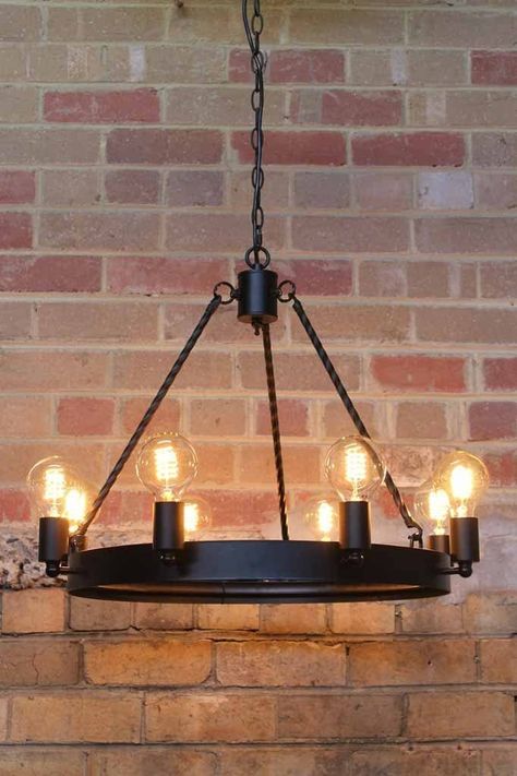 Viking House Interiors, Industrial Brewery, Urban Restaurant, Lodge Chandelier, Gothic Lighting, Black Dining Room Table, Gothic Industrial, Black Metal Rings, Suit Traditional