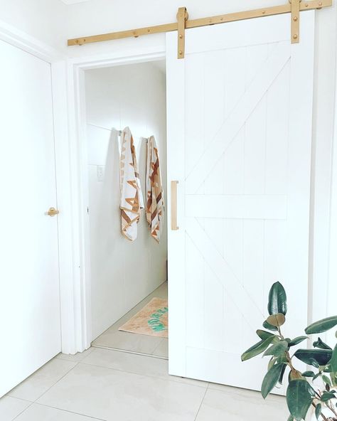 Tara ♡ Our Neutral Abode ⋒ on Instagram: “Barn door before and after! Our old door was fine except it opened into our very small bathroom and backed on to the shower door and with…” Sliding Doors Bathroom Small Spaces, French Barn Doors, Sliding Doors Bathroom, Bathroom Door Ideas, Bathroom Barn Door, Very Small Bathroom, White Barn Door, Beach Bungalow, Linen Cupboard