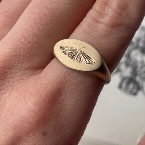 June Cream on Instagram: "The classic house moth signet ring is back up on the website and it has a new pendant friend! I just love moths for some reason, always have. These listings are live and I'll be throwing a bunch of new website stuff at you all month ❤️. #housemoth #mothring #handengraved" Amethyst Jewelry Ring, Moth Ring, Bug Ring, Lost Wax Jewelry, Architectural Rings, Custom Signet Ring, Fancy Jewelry Necklace, Carved Ring, Wax Carving