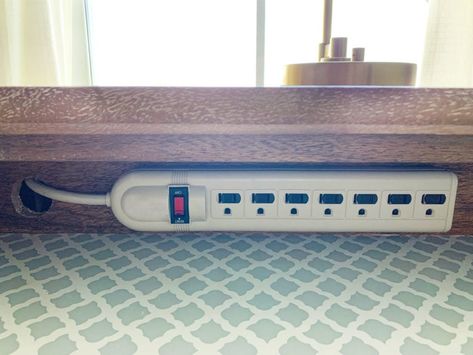 Learn how to create a DIY charging station in your nightstand to hide ugly cords and keep all of your devices charged at all times! | #chargingstation #bedroom #organizedbedroom Diy Charging Station, Charging Station Drawer, Electronic Charging Station, Nightstand Charging Station, Junk Drawers, Phone Charging Station, Hiding Ugly, Hide Cords, Nightstand Organization